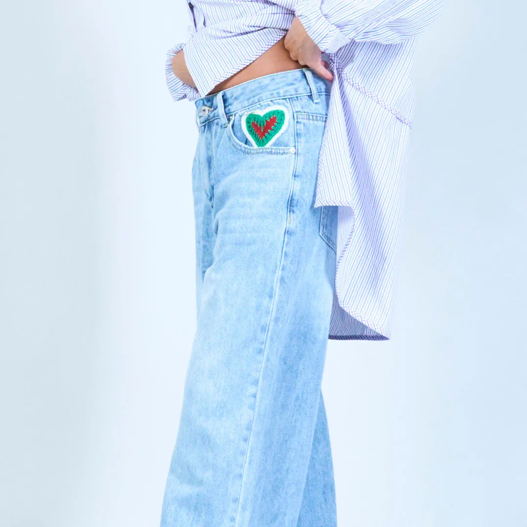 Relaxed-fit denim jeans with embroidered detail wholesale